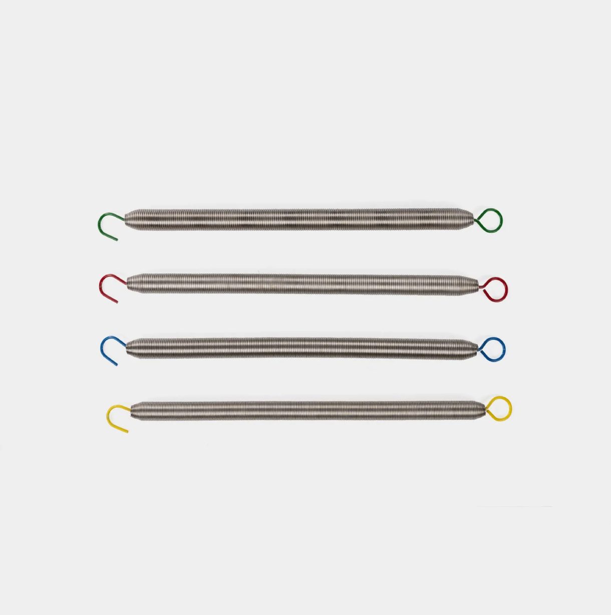 Signature Springs voor standaard Balanced Body Pilates reformers. Signature Pilates Reformer veren in geel, groen, rood en blauw voor gevarieerde weerstand.